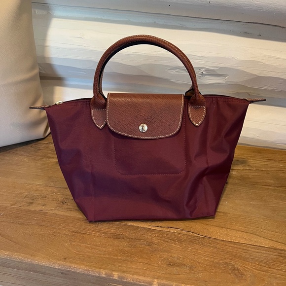 Longchamp Handbags - Small Le Pliage original top handle bag by longchamp